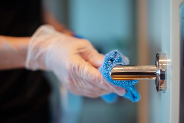 Disinfecting a door knob
